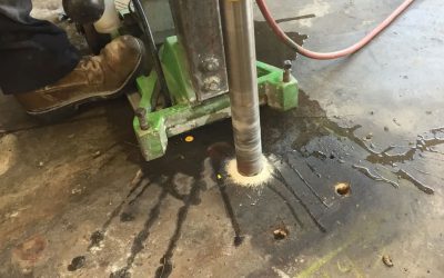 Warehouse Floor Restoration: Removing Old Anchor Bolts