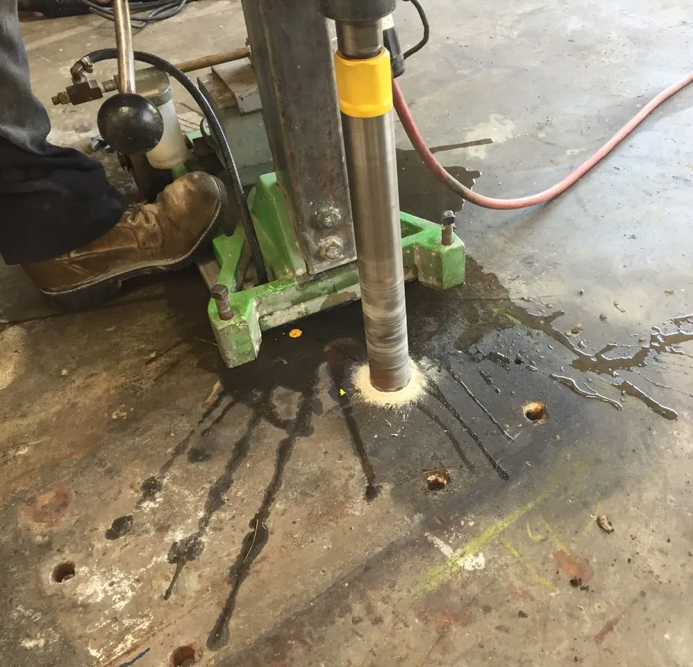 Warehouse Floor Restoration: Removing Old Anchor Bolts Warehouse Floor Restoration: Removing Old Anchor Bolts